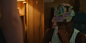 Lucas pondering and listening to Mike explain Hopper will make him stop seeing El if he doesn't do what he says.