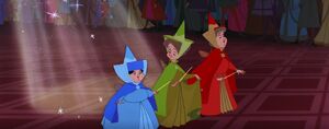 Fauna, Flora, and Merryweather arriving at the christening of the baby Princess Aurora.