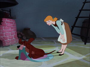 Cinderella waking up her pet bloodhound, Bruno.