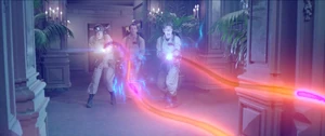 Ghostbusters84-movie-screencaps.com-3737.jpg (1.13 MB) Egon and Ray firing their proton packs when they are spooked by a maid.