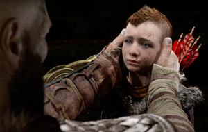 Atreus being comforted by Kratos, in tears after having to kill a human.