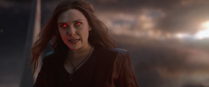 Scarlet Witch confronts Thanos, declaring her revenge on him for killing Vision.