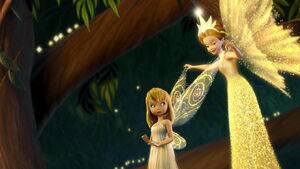 Queen Clairon straightening Tinker Bell's wings.