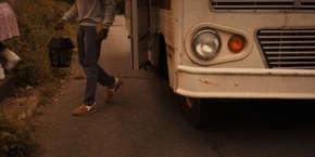 Lucas getting out of the RV upon arriving at the Creel house.