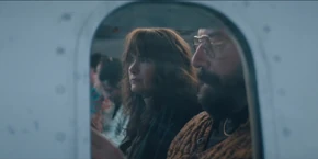 Joyce and Murray flying to Alaska.