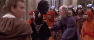 Sabé going to be escorted out of the streets after the Jedi destroy the battle droids.