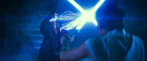 Rey using the Skywalkers lightsabers to destroy Palpatine.