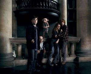 Harry with Ron, Hermione, Dobby and Griphook.