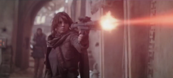 Jyn firing at stormtroopers in the Holy City