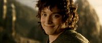 Frodo smiling as a final gesture of goodbye to his fellow Hobbits before sailing off to the undying lands