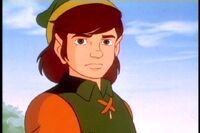Link from The Legend of Zelda Cartoon show and his appearance resembles his sprite from The Legend of Zelda for the NES.