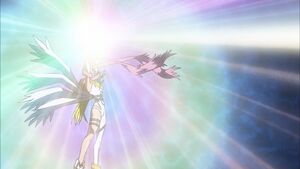 Angewomon uses Saint Air and gives Petaldramon energy to defeat Entmon