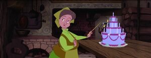 While lighting the birthday candles, Fauna suddenly hears Aurora's singing voice, realizing she has returned home.