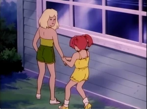 Young Kimber Benton wants to play with her big sister, Jerrica Benton