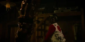 Lucas trying to finish chopping the tentacle.