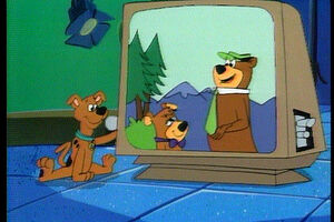 Scooby watching a Yogi Bear cartoon in A Pup Named Scooby-Doo.