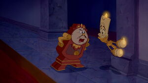 Lumière excited to see a human girl in the castle.