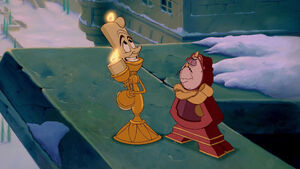 Lumière thinking before he comes up with the idea of Beast showing Belle the castle library.