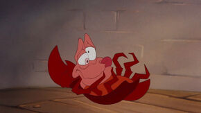 Sebastian on the ground after Scuttle reveals that Vanessa is actually Ursula in disguise.