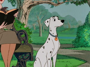 When Pongo notices her watching him, Perdita quickly shifts her gaze away.