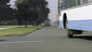 Stone and Angie Piper narrowly miss crashing their car into a bus while they're tailing Nick Torris.