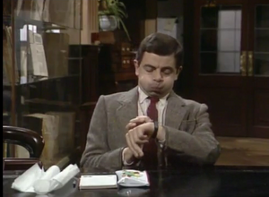 Mr. Bean holding his breath in The Library.