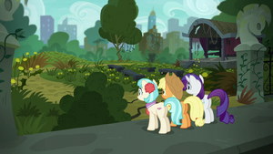 Rarity, AJ, and Coco outside the dilapidated park S5E16