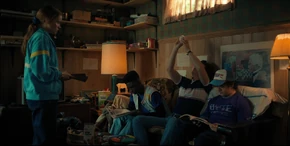 Lucas, Steve, and Dustin still pretending to be occupied when Max approaches them.