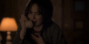 Joyce hearing Will's voice over the phone.