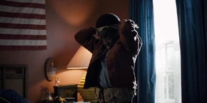 Lucas putting on his bandana as he gears up to go find the Gate.