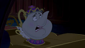 Mrs. Potts shaking in fear when the Beast arrives and proceeds to throw Maurice in the dungeon upon discovering him.