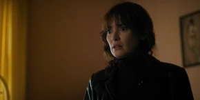 Joyce hearing Becky explain Terry believed her daughter was born with psychic powers and that was why her child was abducted so she could be groomed into a weapon.