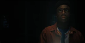 A confused Lucas watching the lights fluctuating.