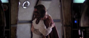 The Skywalker siblings share a hug.