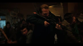 Lucas and his friends seeing something being thrown through a window.