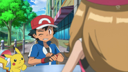 Ash covering his hand after Serena slapped it away from the one slice of chocolate cake he tried to take for himself