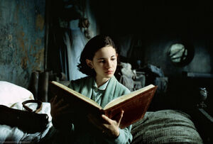 Ofelia reading a storybook