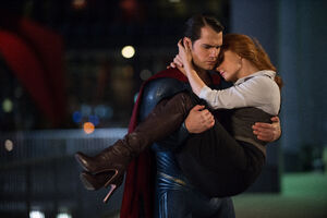 Superman saving Lois.