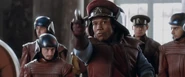 Panaka being given the blaster from Padmé.