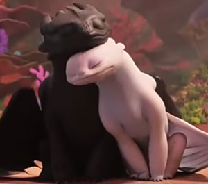 Toothless and the Light Fury nuzzling in how to train your dragon: homecoming