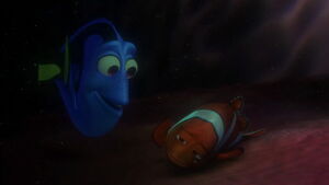 Dory encouraging Marlin to not give up his search.