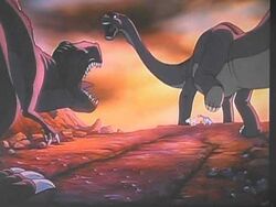 Littlefoot's Mother protecting him and Cera from Sharptooth