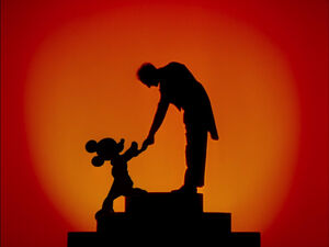 Mickey and Leopold Stokowski congratulating each other after The Sorcerer's Apprentice scene in "Fantasia"