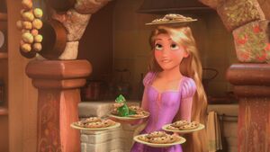 Rapunzel having baked some cookies.