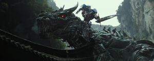 Optimus Prime Riding Grimlock