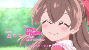 Yui smiles at the end of the opening