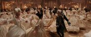 The Prince dancing around the ballroom with a bunch of beautiful women.