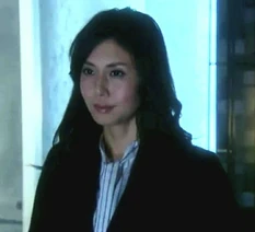 Toko confronting Yagami's corporation President, Keisuke Yagami