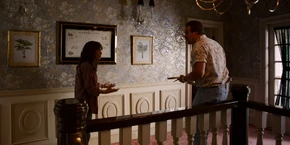 Joyce discussing the machine Scott Clarke had told her about with Hopper.