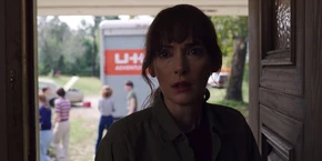 Joyce looking at her empty house one last time before she leaves Hawkins.